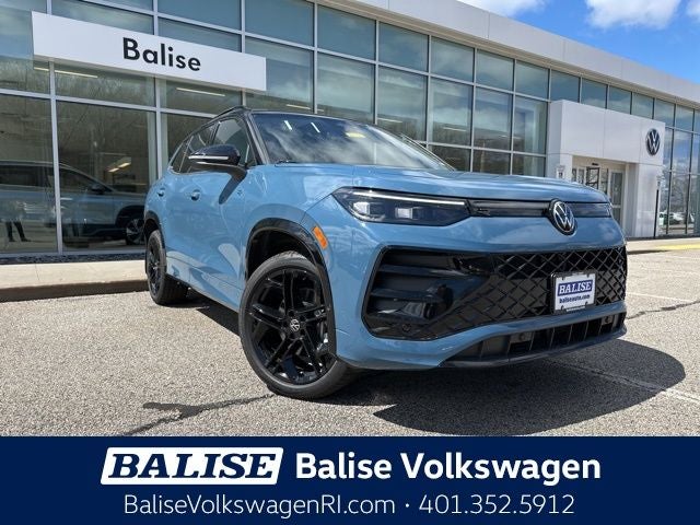 2026 Volkswagen Tiguan 2.0T SE R-Line Black in Monterey Blue W/Deep Black Roof — front three-quarter view