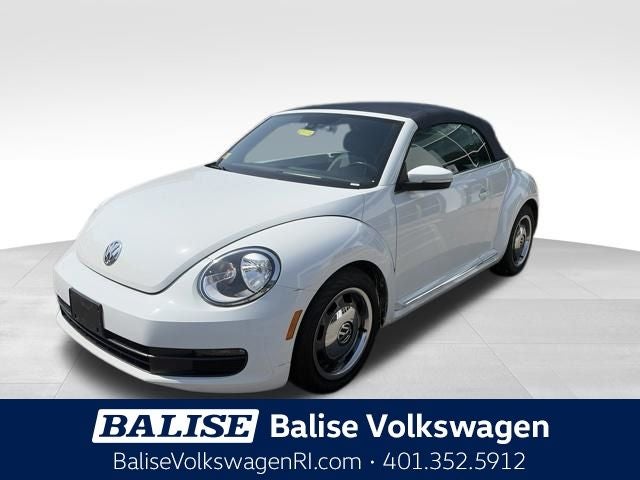 2016 Volkswagen Beetle 1.8T Denim in Pure White — front three-quarter view